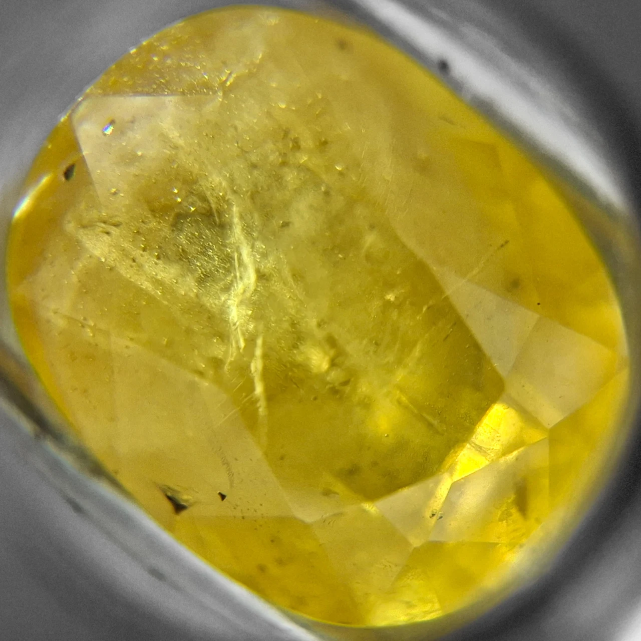Internal inclusions in a heat-treated sapphire at 60-times magnification